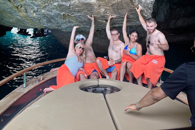 All-Inclusive Capri Boat Tour with City Visit from Positano - The coastal circuit, from coves to caves
