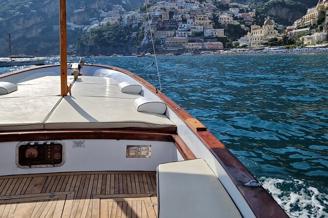 All Inclusive Private Boat Tour to the Amalfi Coast - Leaving Positano on a traditional Gozzo