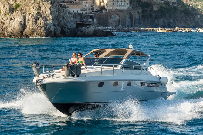 Amalfi Coast Private Boat Day with Swim Stops & Prosecco - Fiordo di Furore and Praiano swimming time