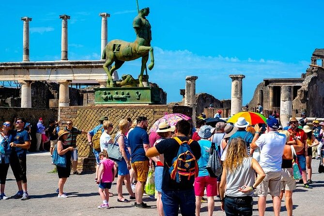 Amalfi Coast to Naples Transfer and 2-Hour Pompeii Private Tour - Casa del Fauno and the Odeon