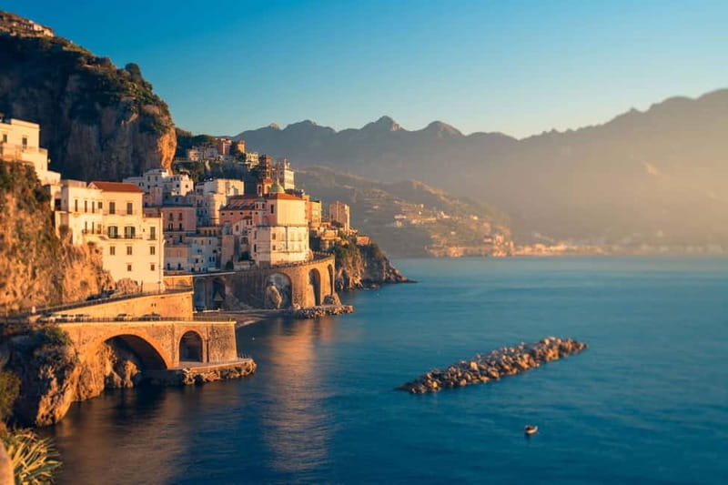 Amalfi: Sunset Boat Tour with Fruit and Drinks - Swimming, snorkeling, and the sunset stop