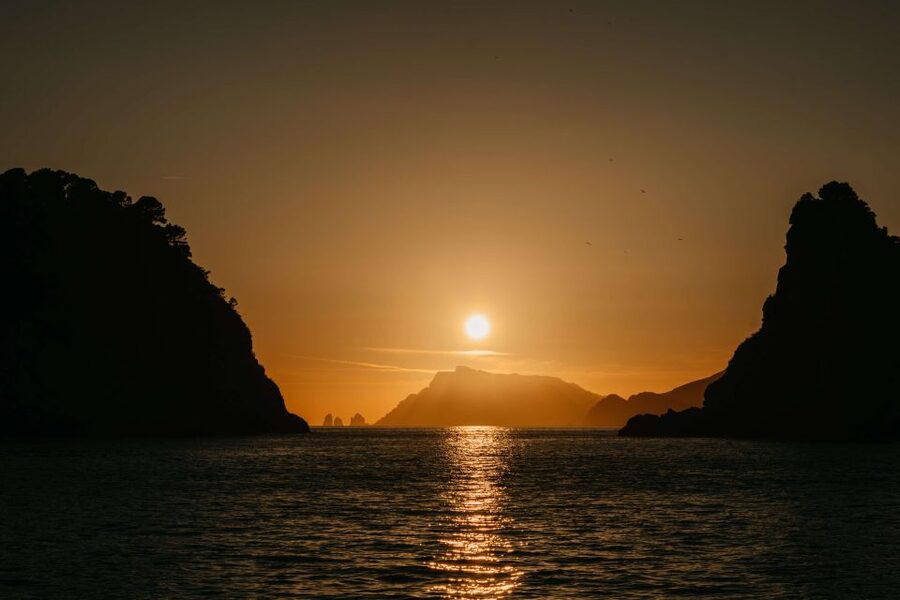 Amalfi: Sunset Boat Tour with Fruit and Drinks - Prosecco, limoncello, fruit, and music on board