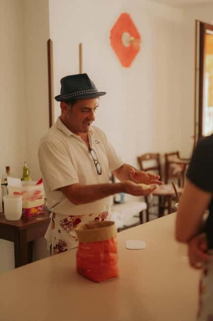 Amalfi: Tagliatelle, Mozzarella & Tiramisù Cooking Workshop - Sitting down to eat what you made