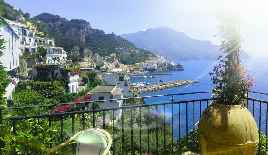 Amazing Amalfi Coast Drive from Sorrento - Positano: steep streets, shops, and coastal views