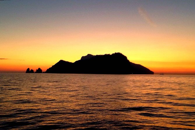 Amazing Sunset Tour around Capri coast and grottoes with Aperitif - From Marina Grande to the Green Cave