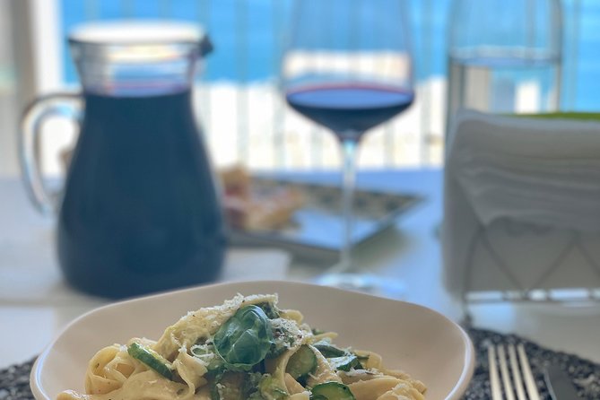 Authentic Cooking with Locals: Meal, Wine & Scenic Views - The Praiano setting adds real value