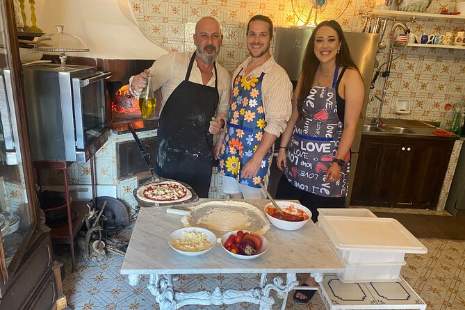Authentic Pasta & Pizza Cooking Class with Sorrento Coast Pickup - Sitting down to eat what you made