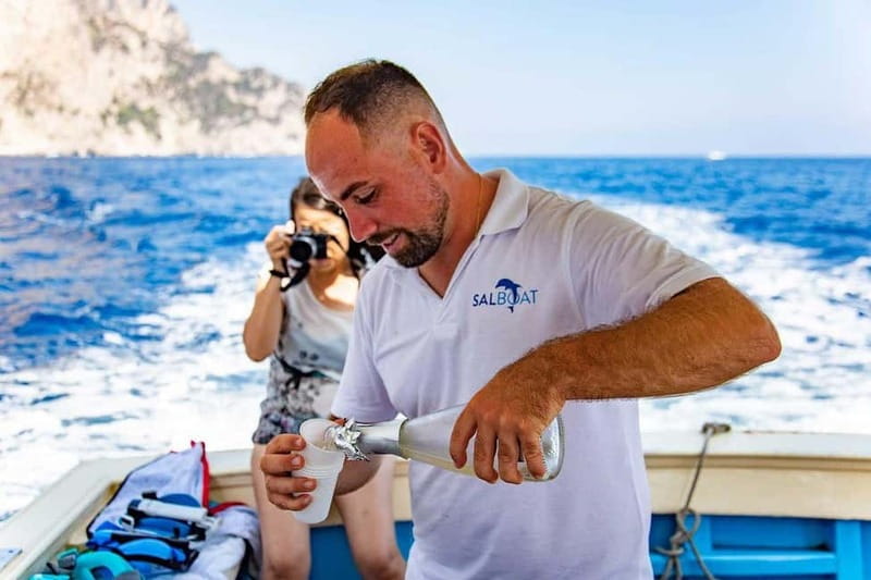 Boat Tour to Capri with Lunch on Board, Swimming and Fun - Swimming Near Marina Piccola