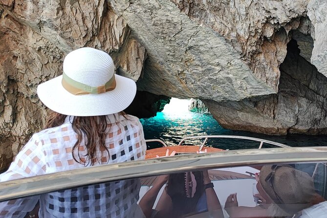 Capri and Blue Grotto Small Group Boat Tour - The best swimming pause comes at Punta Ventroso