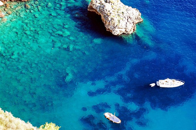 Capri and Positano Private Boat Excursion - The southern lighthouse and Capri’s coastal cliffs