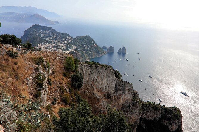 Capri & Blue Grotto: Full-Day Tour with Guided Island Exploration - Capri town, shopping, and the Augustus Gardens