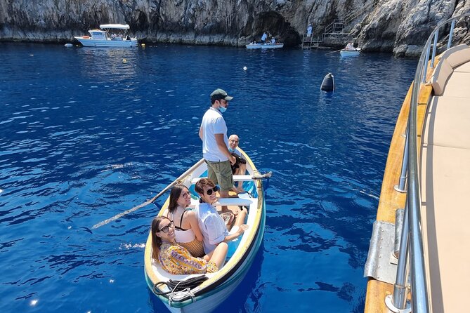 Capri Blue Grotto Small-Group Boat Day Tour From Sorrento - Seeing Capri’s grottos and Punta Carena