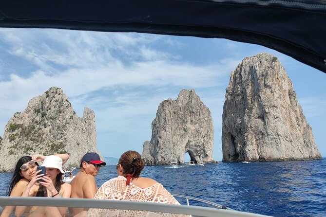 Capri Boat Tour and City Visit from Sorrento - The south coast and the Faraglioni