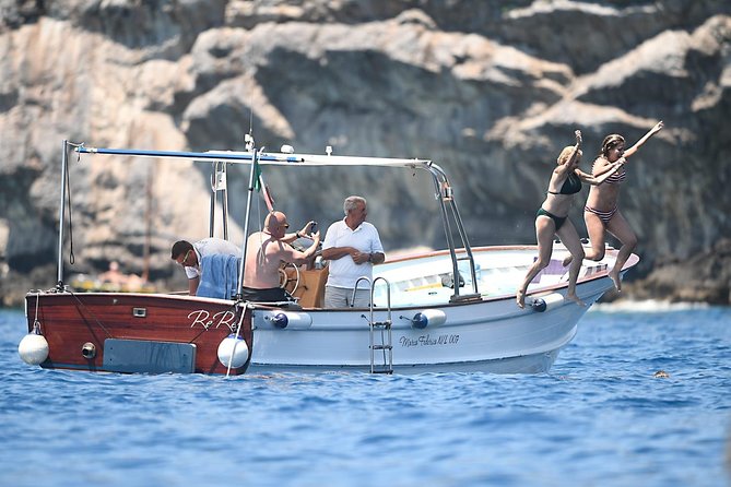 Capri Boat Tour: Grottoes, Swim & Sip Limoncello in a Small Group - Punta Carena and the island’s western edge