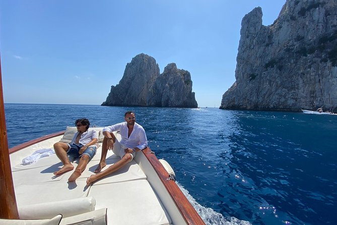 Capri Boat Tour: Grottoes, Swim & Sip Limoncello in a Small Group - Faraglioni and the Arch of Love