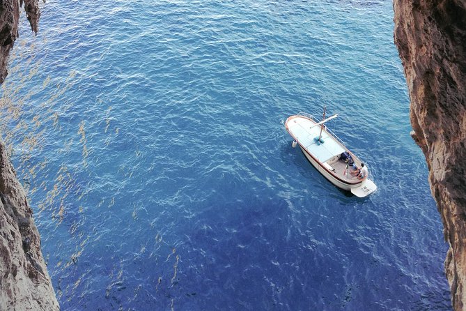 Capri by Boat private Comfortable tour - The Faraglioni in their famous setting