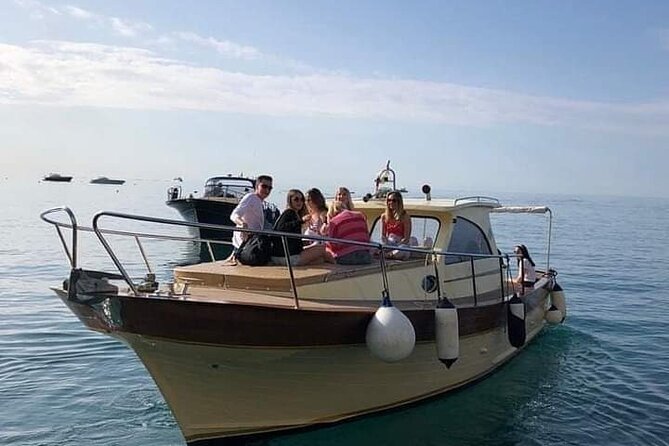 Capri Collective Boat Excursion from Positano - Touring Capri’s caves and cliff-lined coast