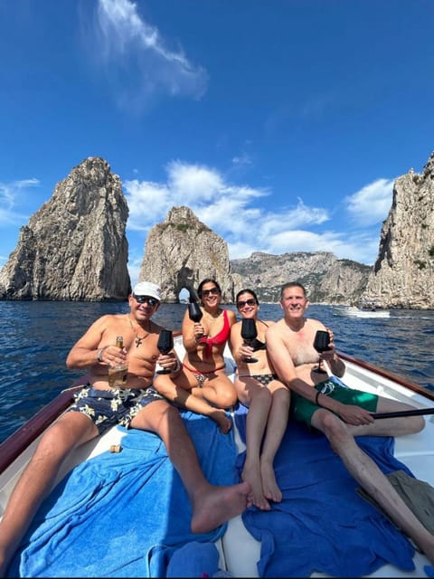 Capri: Exclusive Boat Tour of Hidden Gems with Swimming - Circling Capri’s Caves and Villas