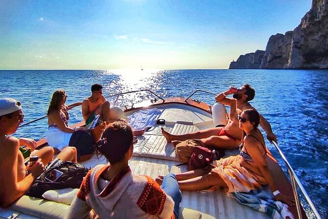 Capri Guided Boat Experience with Island Exploration and Transfer - Grotto stops and swimming in clear water