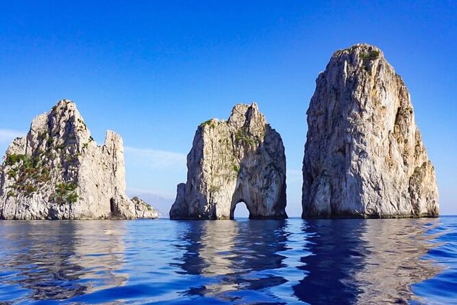 Capri Positano and Amalfi Ischia Private Boat Tour from Sorrento - Capri’s caves, hearts and famous rock stacks