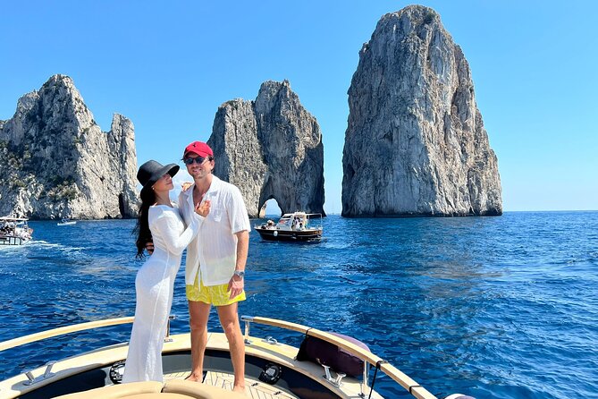 Capri Premium Boat Tour and City Visit Free Bar and Aperitif - Heart Cave and Punta Carena show a quieter side