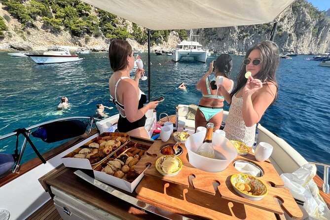 Capri Premium Boat Tour and City Visit Free Bar and Aperitif - Sailors’ Cave and the Faraglioni bring the classic Capri views