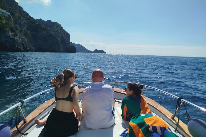 Capri Premium Boat Tour and City Visit Free Bar and Aperitif - White Grotto and Red Grotto add color to the circuit