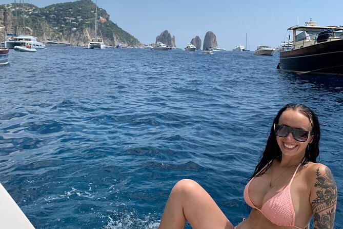 Capri Private all inclusive Boat Tour with City Exploration - Saints Grotto, Green Grotto, and the swimming break