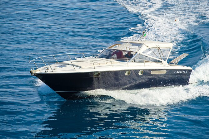 Capri Private Boat Excursion with Faraglioni and Blue Grotto - The Faraglioni rocks from the best angle