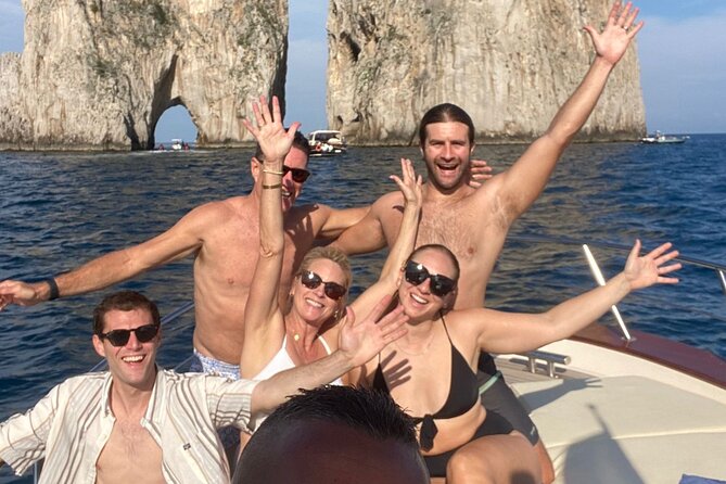 Capri Private Boat Tour from Positano or Praiano - Crossing beneath the Faraglioni
