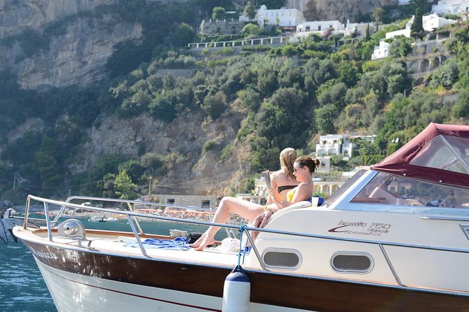 Capri Private Boat Tour from Sorrento, Positano or Amalfi - Swimming beside the Green Grotto