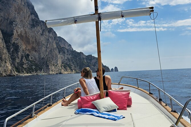 Capri Secret Corners Experience - Capri from the water, with Enzo at the helm