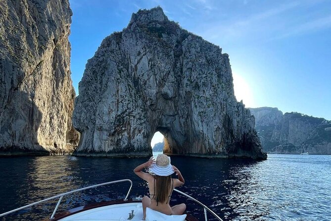 Capri Secret Corners Semi-Private Boat Tour with Local Captain - Marina Piccola, sailors, and the Faraglioni