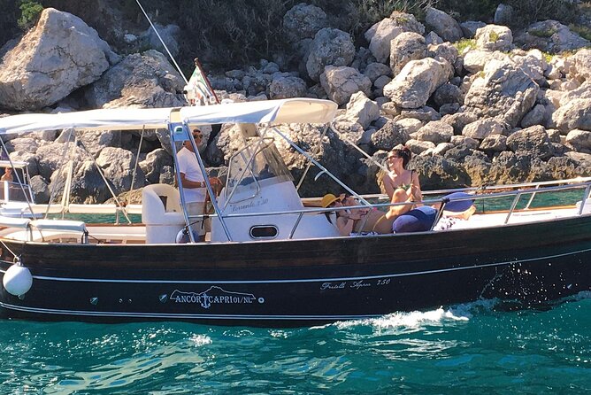 Exclusive Boat Tour to Capri with Swim Stop and Aperitif - Capri’s eastern and western coast by gozzo