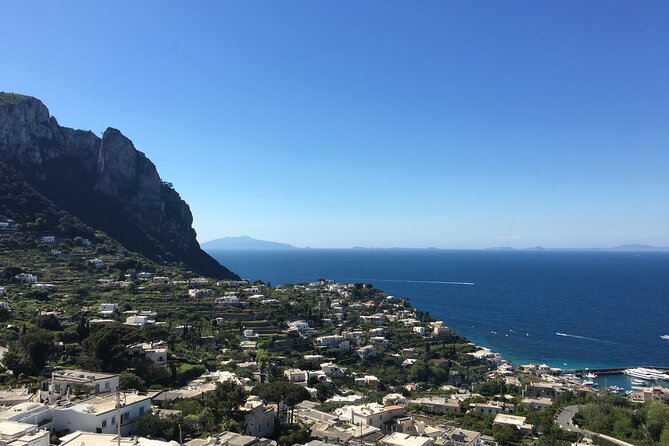 Exclusive Private VIP Capri Boat Experience on a Gozzo - Docking at Capri for lunch and free time