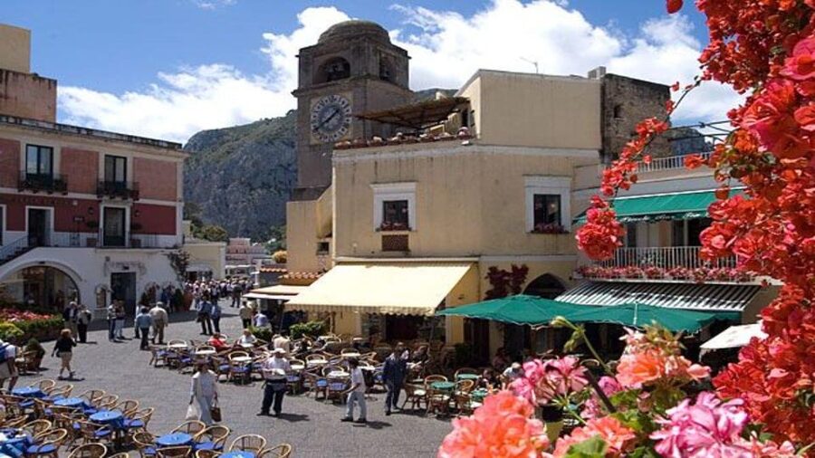 From Positano: Capri Island Group Cruise with Blue Grotto - The captain and the group atmosphere