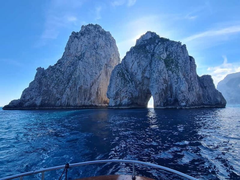 The Faraglioni stacks off Capri seen from a boat