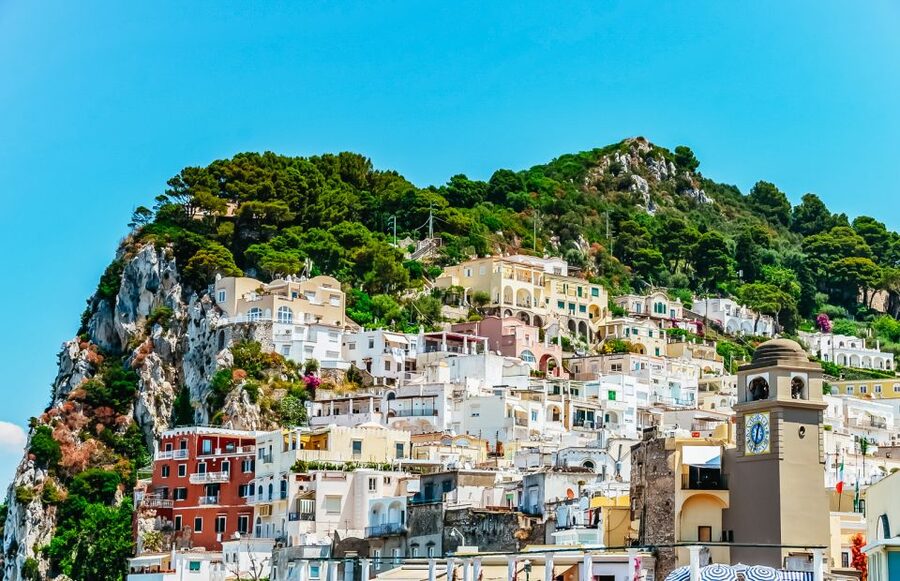 From Sorrento: Capri Guided Boat Tour - A small boat view of Capri from Sorrento