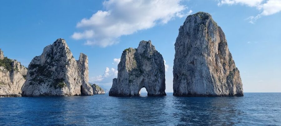From Sorrento: Full Day Capri Private Boat Trip with Drinks - Passing through the Faraglioni