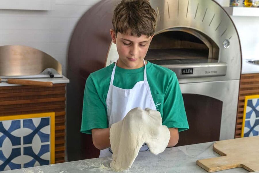 From Sorrento: Pizza-Making Class w/ View of Mount Vesuvius - Stretching the Dough With a Little Help