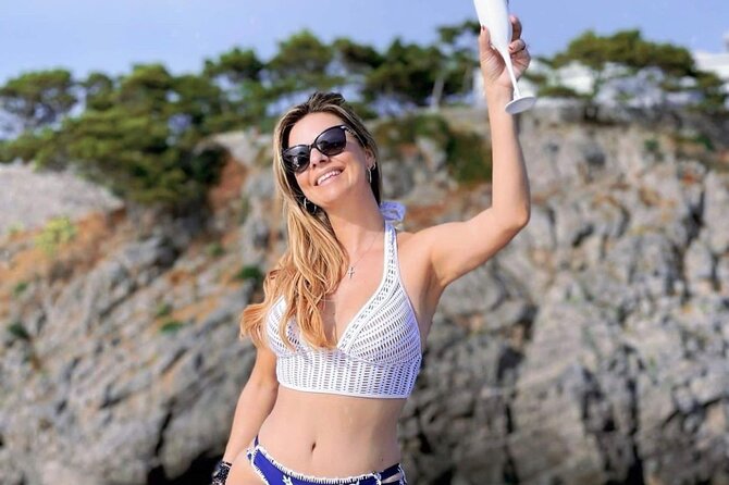 Full day Private Capri boat tour from Positano - Green Grotto and Punta Carena Lighthouse