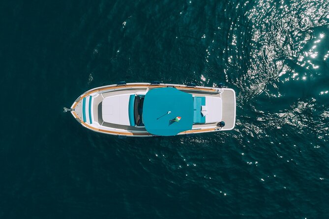 Ischia and Procida Private Yacht Tour from Sorrento - Food, drinks, towels, and the onboard mood