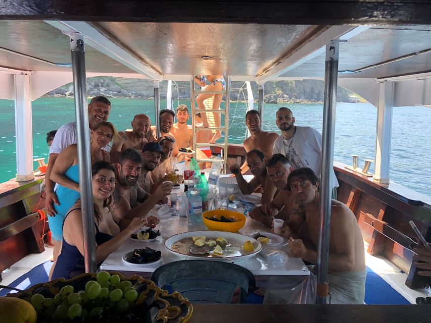 Ischia: Island Boat Tour with Neapolitan Lunch & Snorkeling - A full day circling Ischia by sea