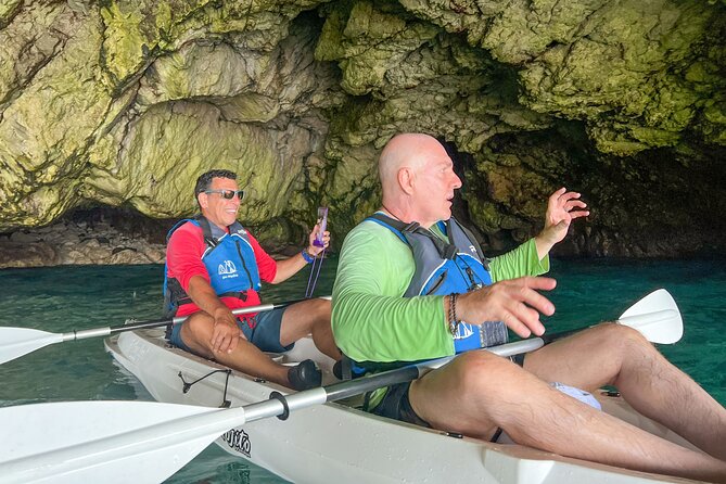 Kayak tour in Capri between caves and beaches. Photos included. - Swimming in Capri’s clear water