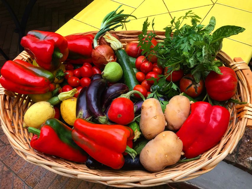 Piano di Sorrento: Cooking Class with Food Tasting and Wine - Picking produce among lemons and oranges