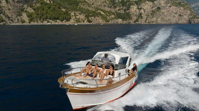 Positano: Amalfi Coast & Emerald Grotto Private Boat Tour - Snorkeling at Scoglio dell’Isca