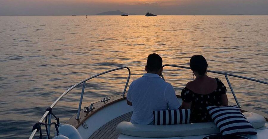 Positano: Sunset Cruise Day Trip with Drinks and Snacks - Leaving Positano from the main beach