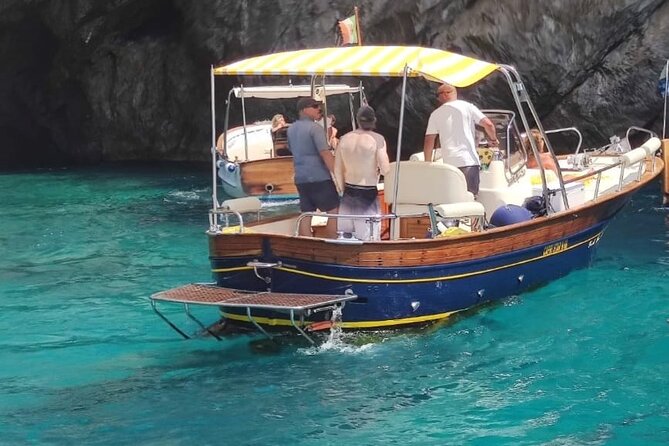 Private boat tour Capri Full day - Time on Capri, lunch, and a break from the water