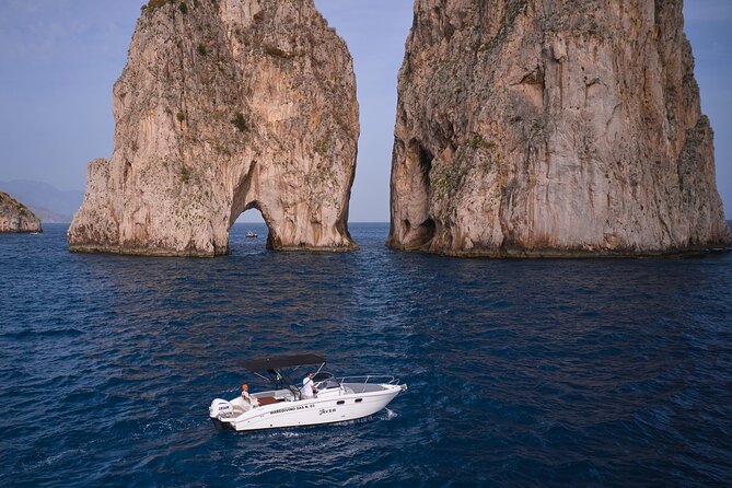 Private Boat Tour with Saver 7.50 WA - The Faraglioni arch is Capri’s classic boat moment