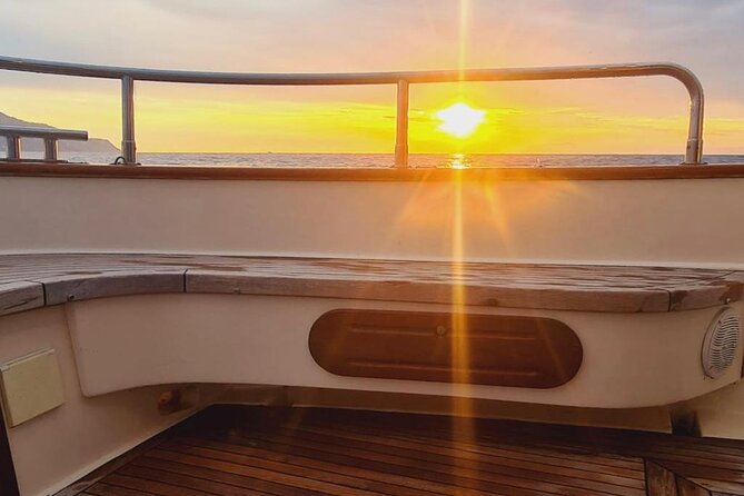 Private Tour of the Island of Capri by Boat and Visit to the Caves - Drinks, towels, music, and comfort onboard